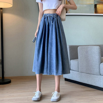 Close-up of comfortable plus-size denim skirt-pants, showcasing the wide leg and quality fabric.