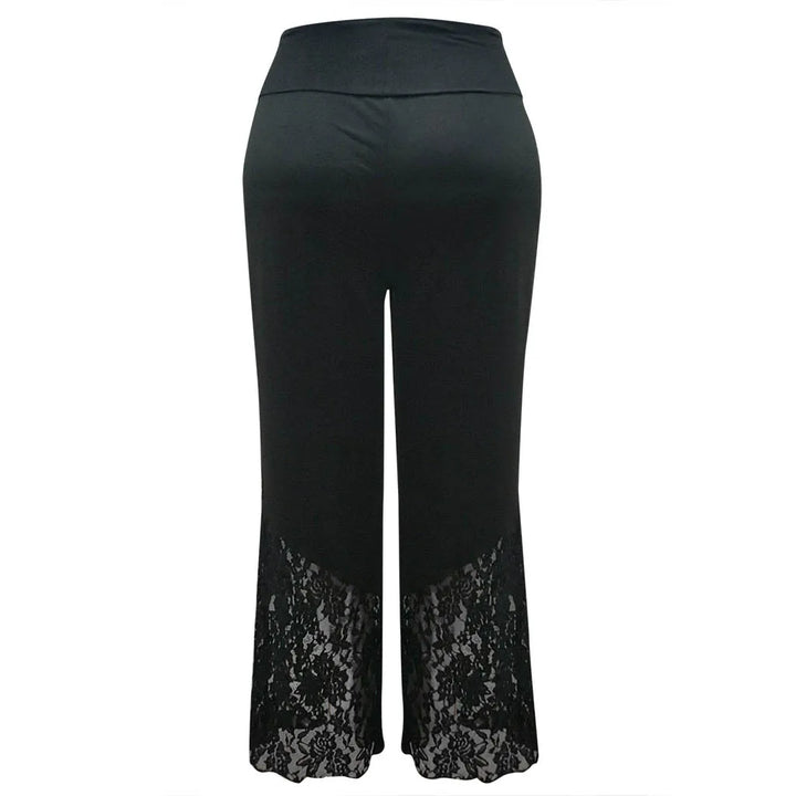 Elegant plus-size women's wide-leg lounge pants featuring delicate lace. High-waist, comfortable & fashionable.