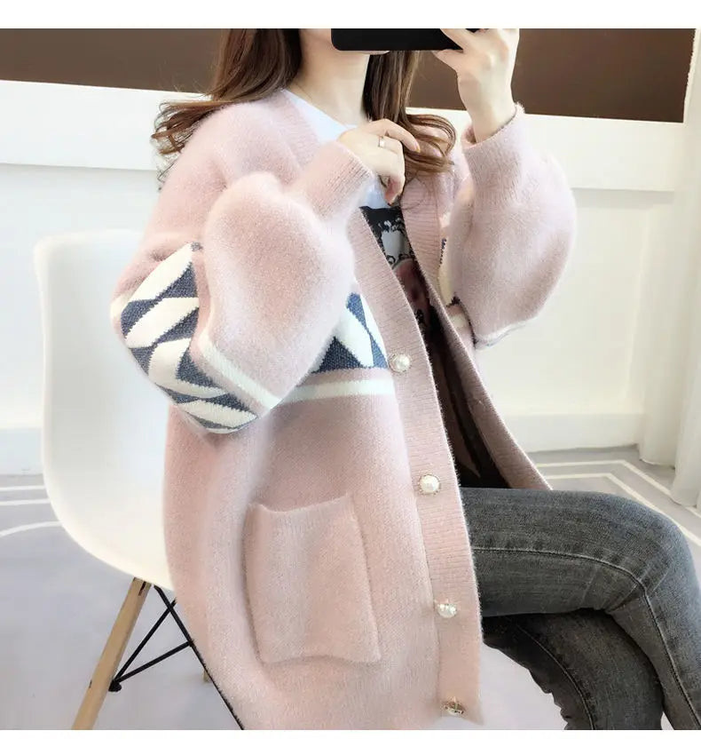Women's loose fit plus size sweater, cozy, with button accents, perfect for layering or standalone.