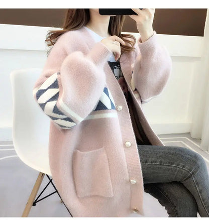 Women's loose fit plus size sweater, cozy, with button accents, perfect for layering or standalone.