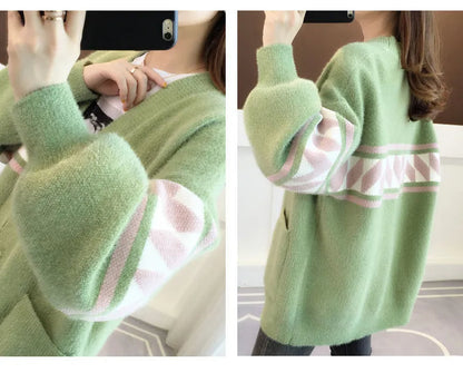 Chic plus size women's sweater, cozy knit, versatile for casual or dressed-up looks.