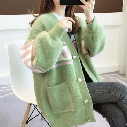 Warm plus size sweater for women, comfortable clothing, featuring button details, ideal for winter styles.