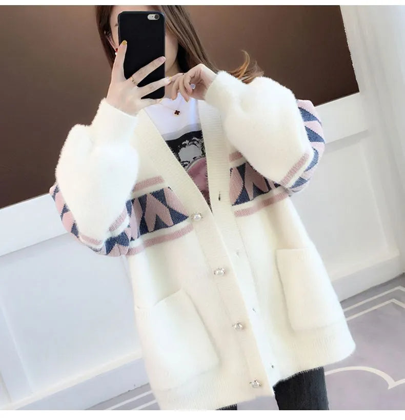 Cozy plus size women's sweater, oversized, soft knit, great for relaxed all-day wear.
