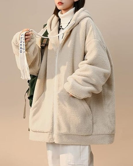 Side profile of a plus size women's fleece jacket, warm, cozy, perfect for casual layering.
