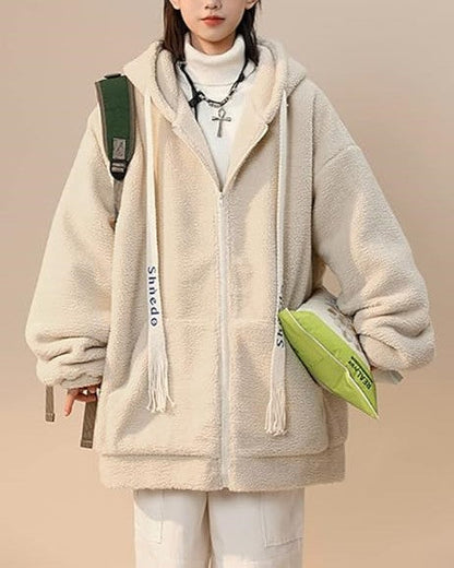 Woman wearing a cozy plus size fleece jacket, full zip, comfortable for casual fall outings.