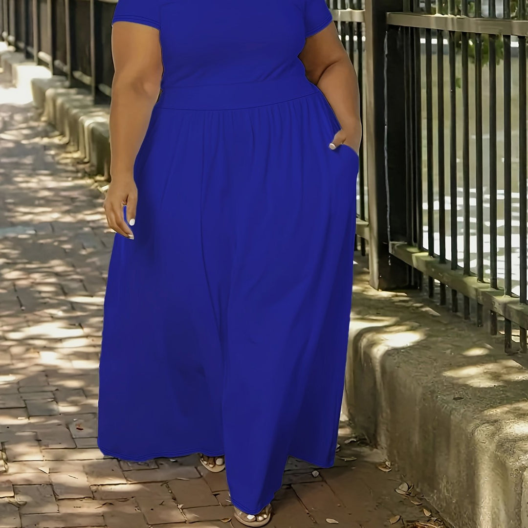 Plus size women's short sleeve maxi dress with pockets, flowy and elegant for casual wear.
