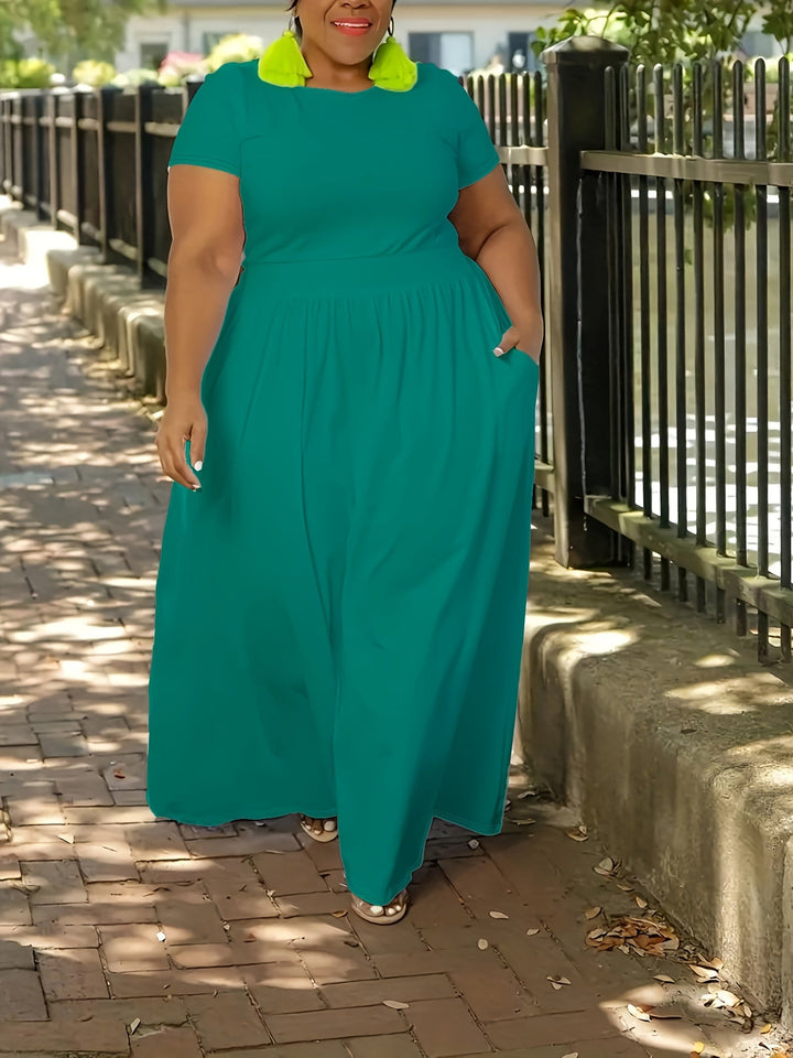 Women's plus size short sleeve maxi dress with pockets, perfect for summer casual fashion.