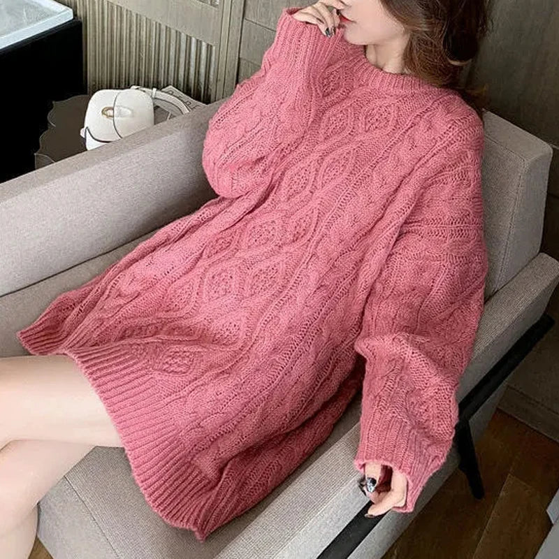 Model wearing a stylish plus size women's oversized cozy sweater, ideal for fall fashion & winter wear.