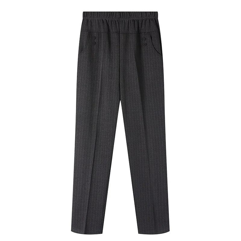 Plus size women's striped fleece pants with flexible waist, offering comfortable winter wear.
