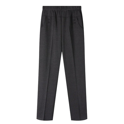 Plus size women's striped fleece pants with flexible waist, offering comfortable winter wear.
