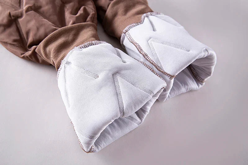 Elastic ribbed cuffs on women's thermal joggers, keeping warmth in & providing a snug fit.