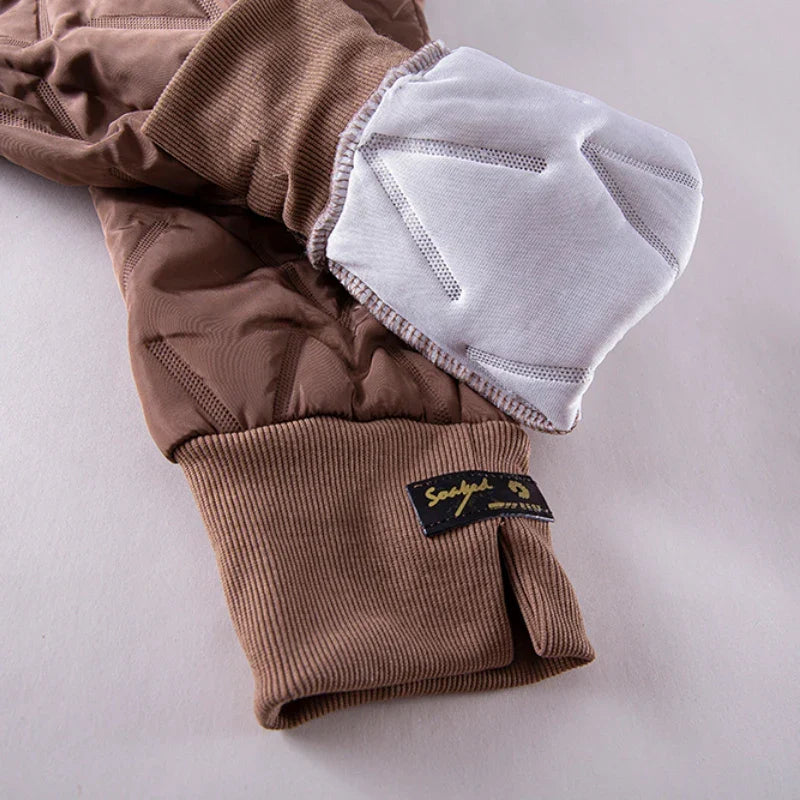Happy woman wearing comfortable plus size thermal winter pants, enjoying cold weather.
