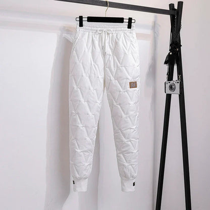 Soft fleece lining of women's thermal winter pants, ensuring warmth & comfort in cold weather.