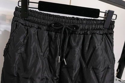 Women's plus size thermal joggers with practical pockets, warm & comfortable for winter.
