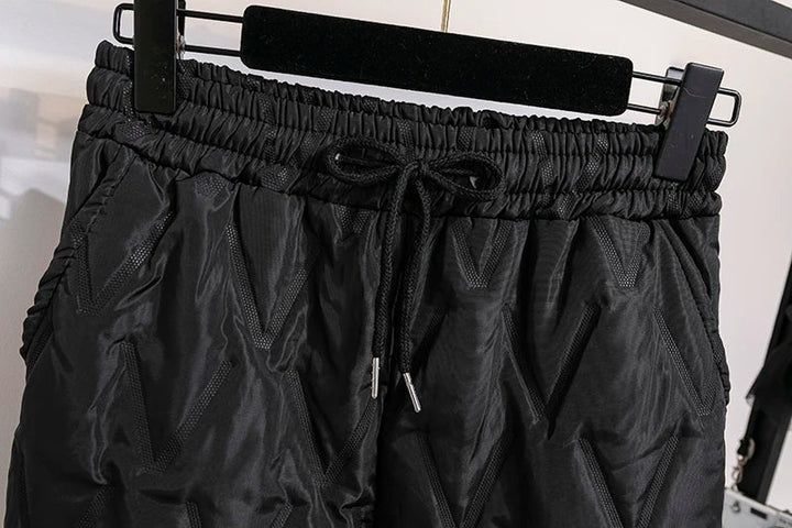 Women's plus size thermal joggers with practical pockets, warm & comfortable for winter.