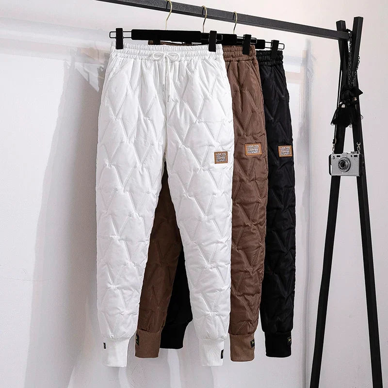 Woman stretching in comfortable plus size thermal winter pants, perfect for flexible movement.