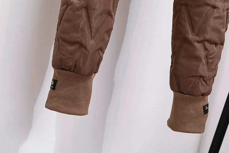 High waist elastic band on women's thermal winter pants for a secure, comfortable fit.