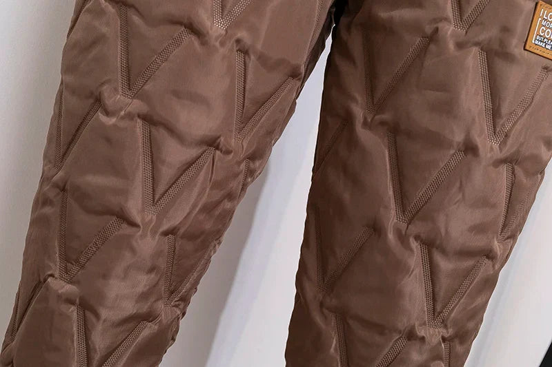 Stylish plus size women's winter pants, ideal for casual wear & cold weather activities.
