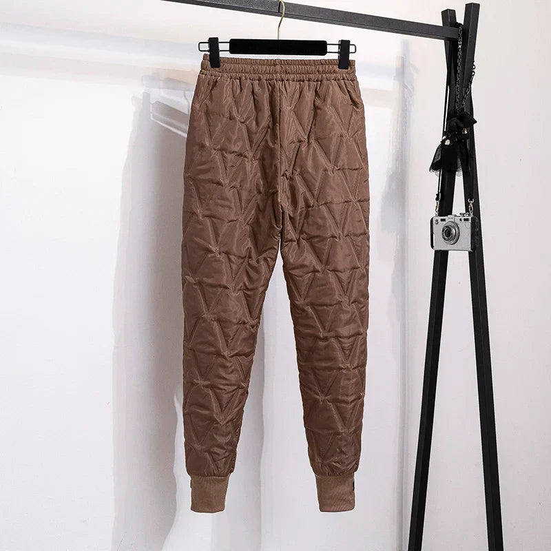 Front view of women's high-waisted thermal winter pants, plus size for ultimate comfort.