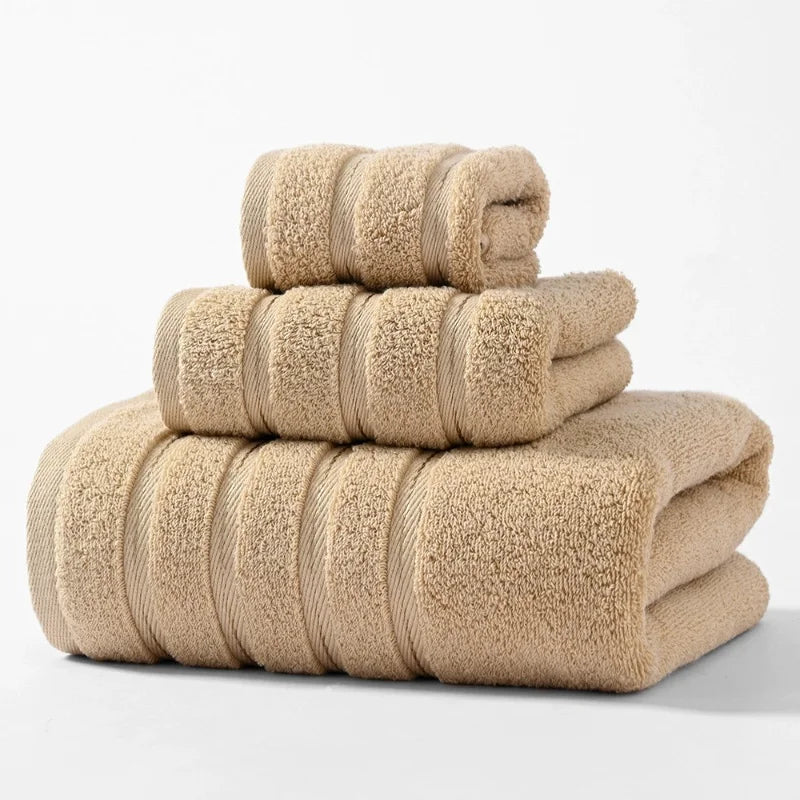 Plush absorbent cotton bathroom towel set, soft & luxurious for spa-like comfort.