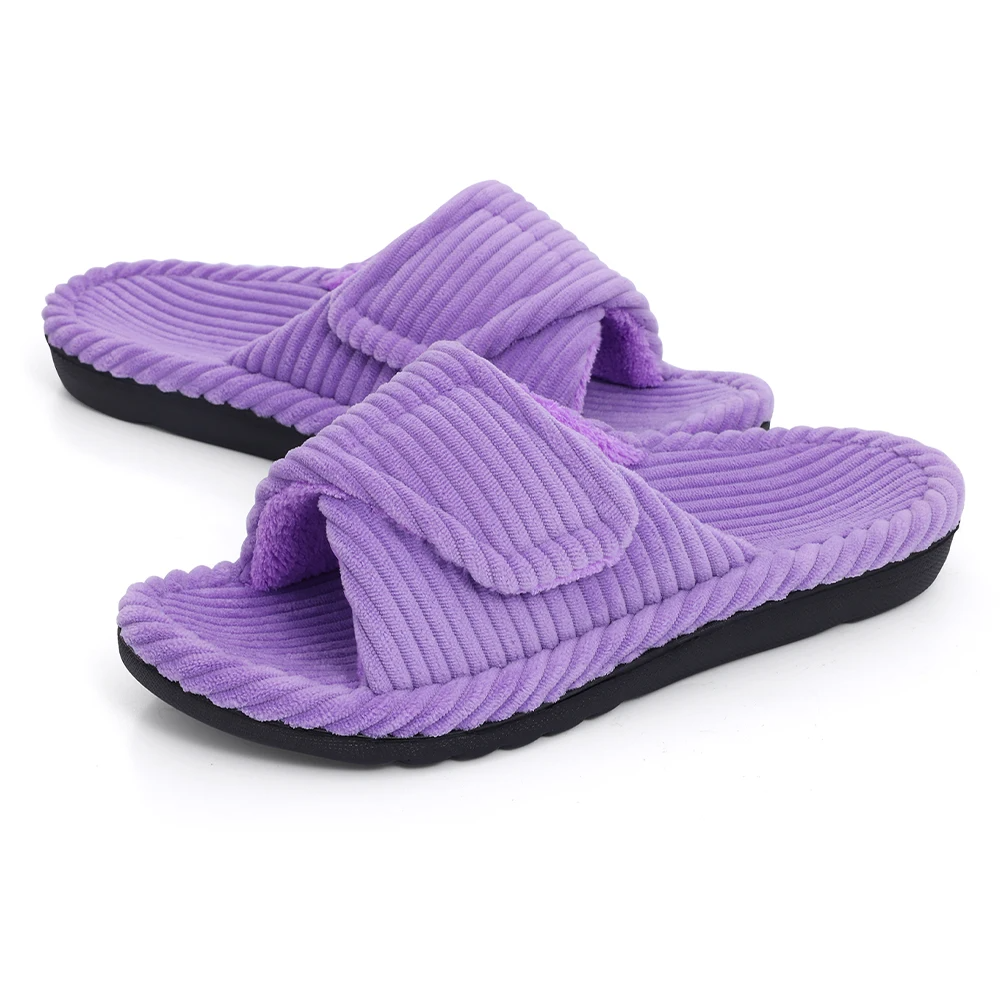 Close-up of plush texture on women's adjustable comfort slides; cushioned for indoor-outdoor footwear.