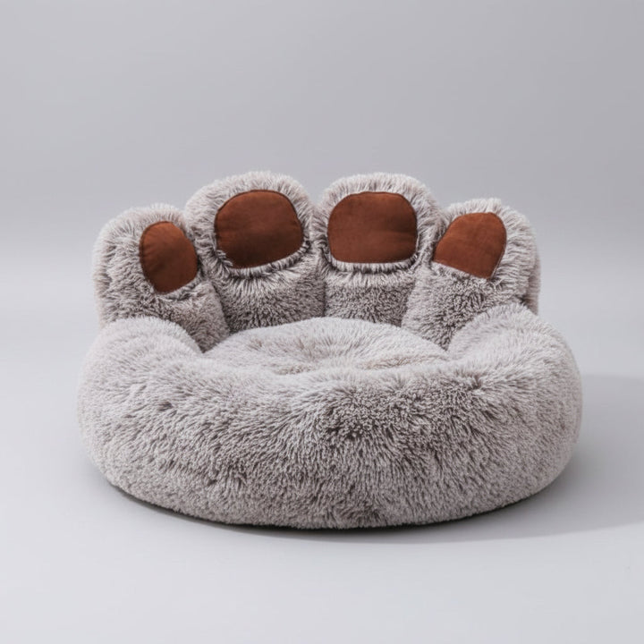 Luxurious grey plush pet sofa bed with raised rim, providing comfort & support for dogs, easy-clean washable cover.