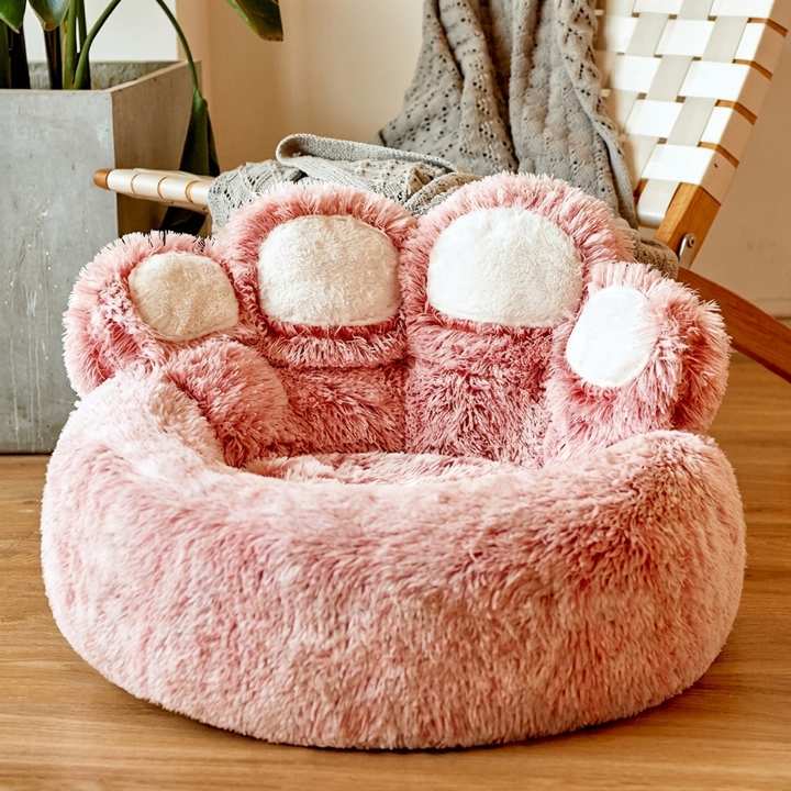 Soft faux fur calming dog bed, pet sofa style, with a supportive design and durable, fully washable cover for comfort.