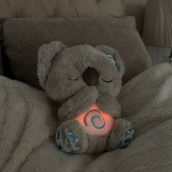 Unisex Calming Koala plush toy, a breathing sleep aid for anxiety relief and peaceful, soothing relaxation.