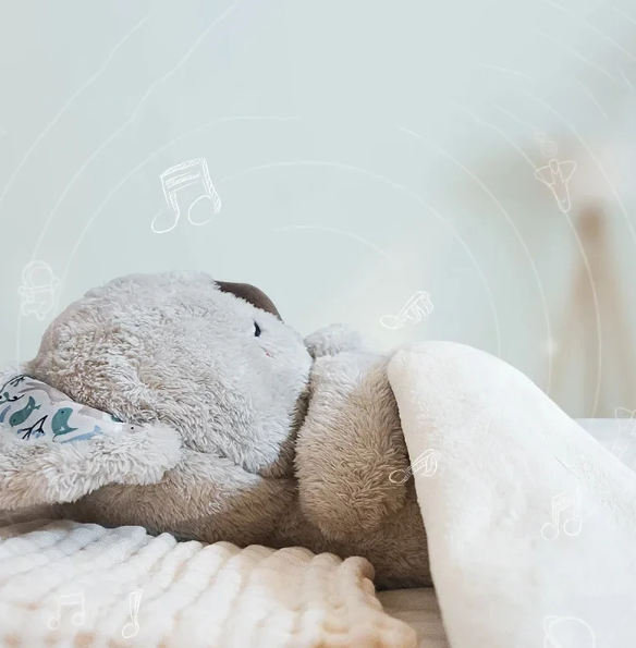 Gentle breathing Calming Koala sleep aid with subtle night light, promoting relaxation and aiding restful sleep.