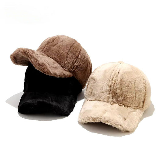 Plush faux fur cap for women, soft and warm winter headwear.
