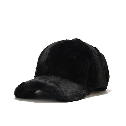 Stylish women's faux fur cap, cozy plush accessory for cold winter fashion.