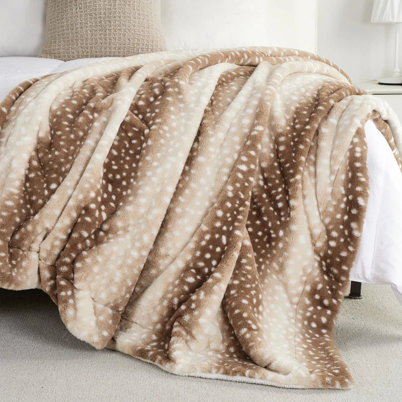Reversible faux fur deer blanket, ultra-plush for ultimate winter warmth and cozy comfort. Great for home or living room.