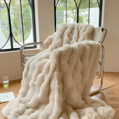 Snuggle up with this soft faux fur throw blanket, ultimate winter warmth and cozy comfort for chilly evenings.