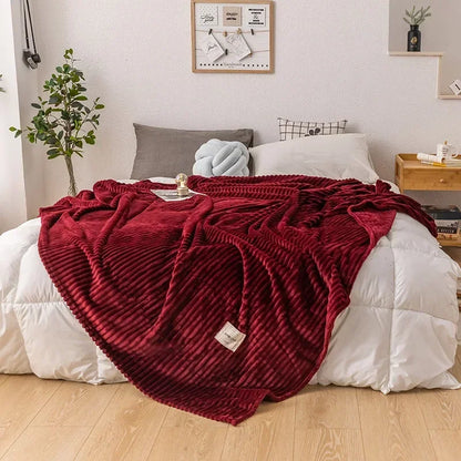 Soft plush flannel blanket. A cozy autumn throw in a solid color, enhancing home decor & bedroom comfort.