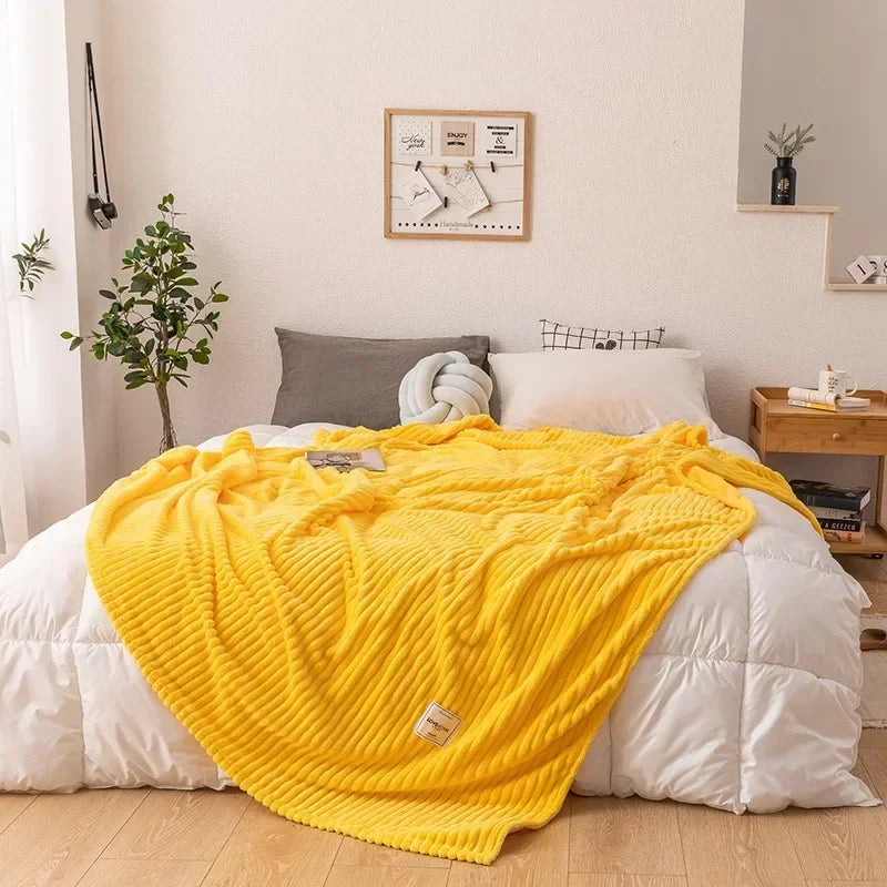 Warm & large solid color plush flannel blanket. Perfect cozy throw for autumn and winter bedroom comfort.