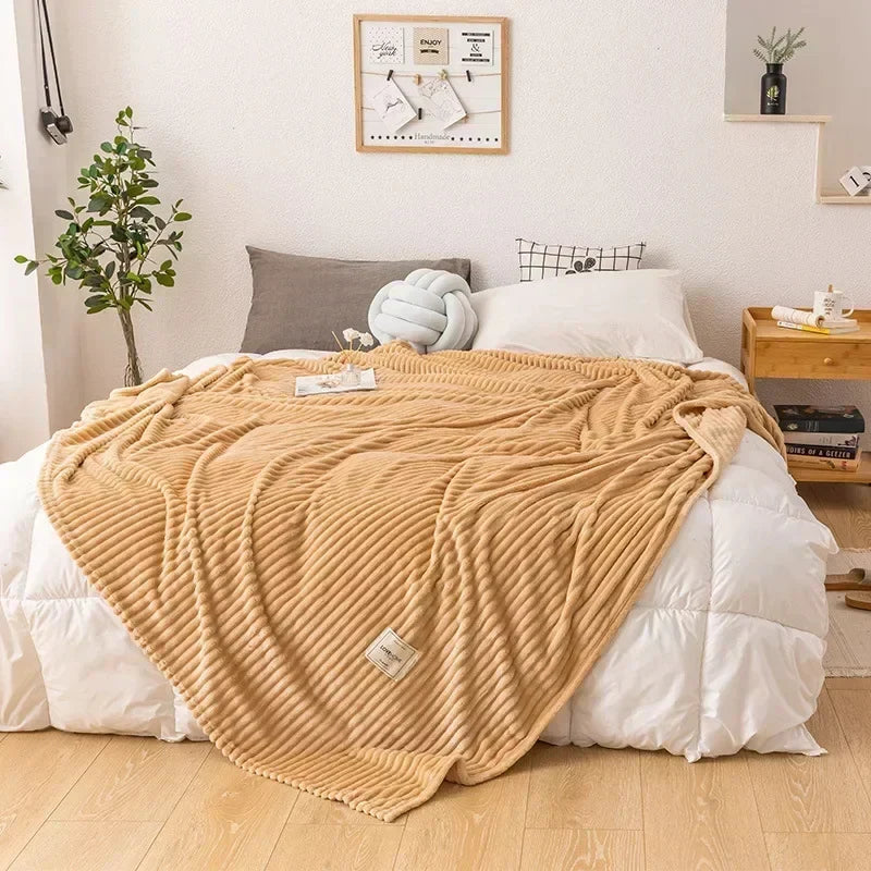 Stylish solid color plush flannel blanket. Large, warm autumn throw for cozy home decor and bedroom comfort.