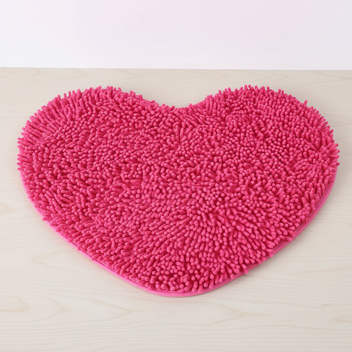 Non-slip plush heart bath mat. Absorbent chenille microfiber. Perfect for safe & stylish bathroom decor.
