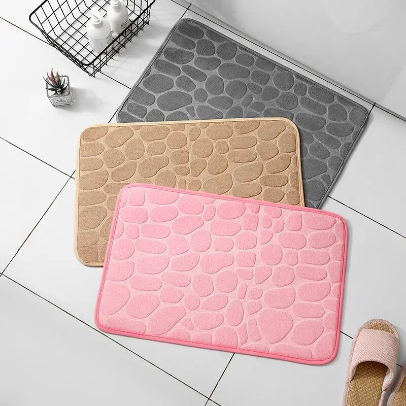 Close-up of soft, luxurious embossed velvet memory foam mat, showcasing plush texture & comfort.