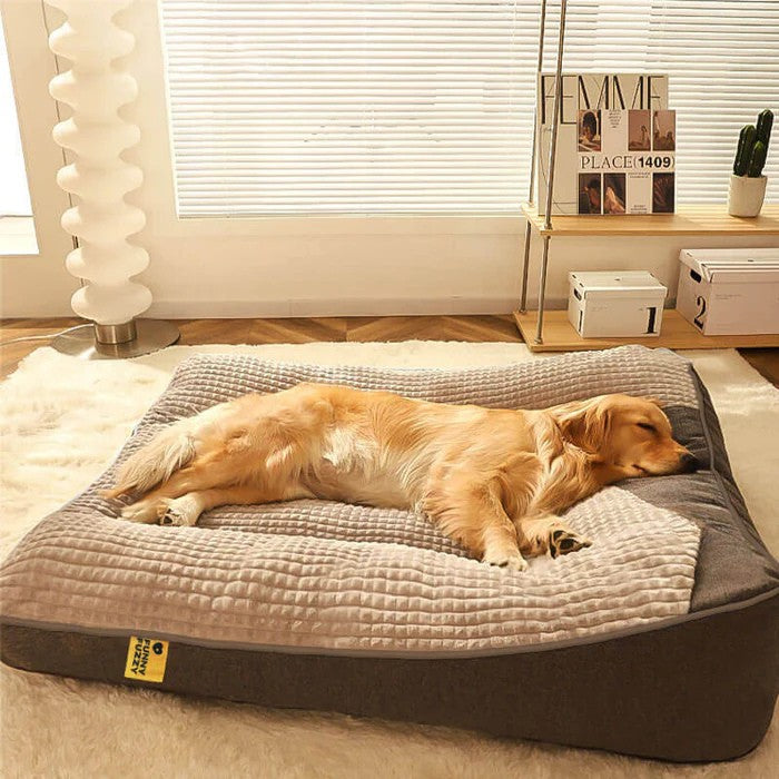 Large brown orthopedic dog bed with supportive head pillow, ideal for big dogs & joint pain.
