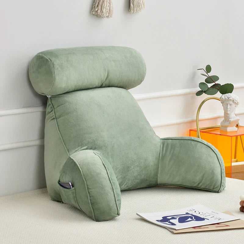 Ultra-soft reading lounge pillow with arms, ideal for cozy evenings and relaxation.