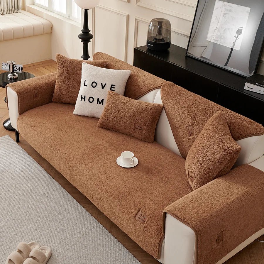 Soft polyester plush sofa cover. Enhance your living room with this warm, comfortable & non-slip couch protector.