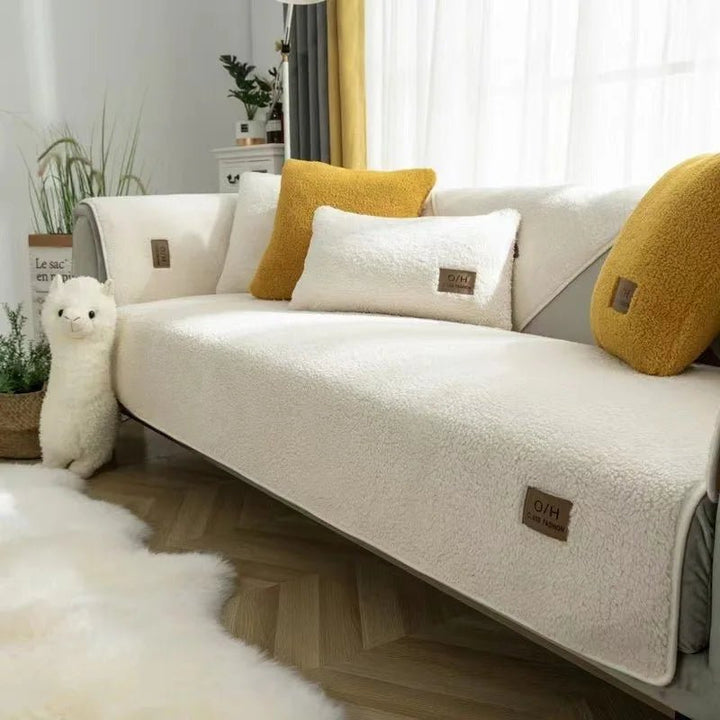 Cozy comfort plush sofa cover. Soft, warm polyester couch protector providing ultimate protection for your home decor.