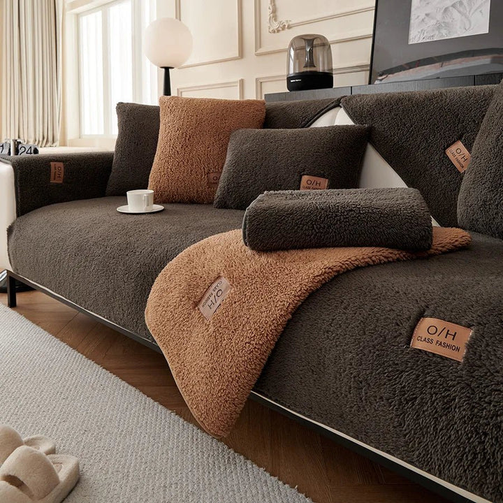 Pet-friendly plush sofa cover. Durable & washable couch protector for ultimate comfort and living room decor.