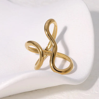 Elegant women's infinity symbol wrap ring in polished gold. Tarnish-free, adjustable, and hypoallergenic.