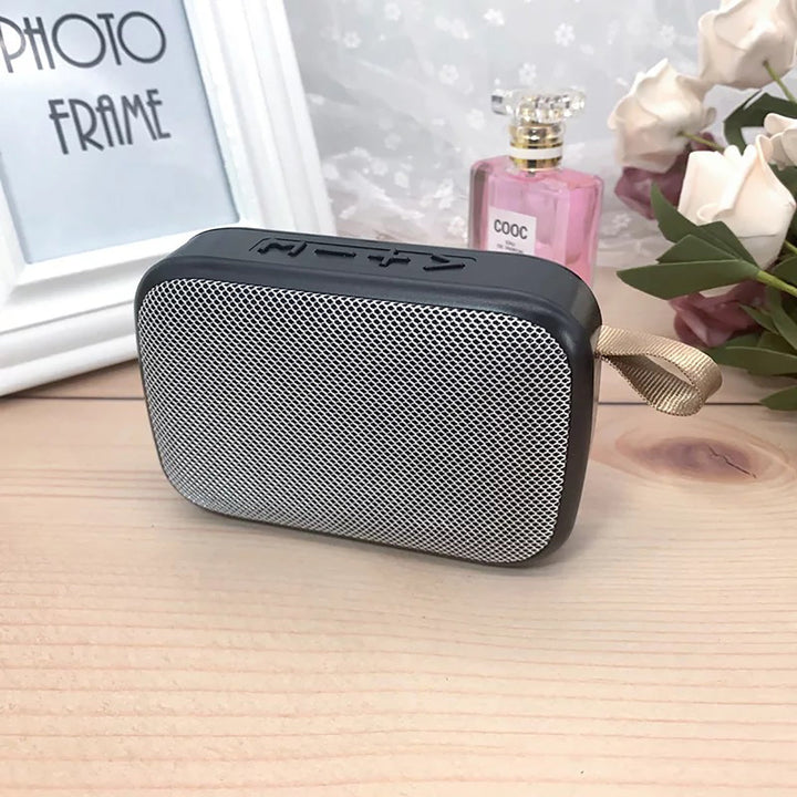 Compact outdoor Bluetooth speaker for travel. Enjoy wireless HIFI audio & 3D stereo music.