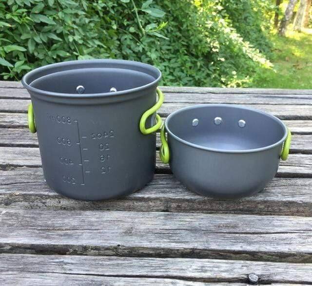 Backpacking cookware set with a portable mini stove, excellent for compact and efficient outdoor cooking.