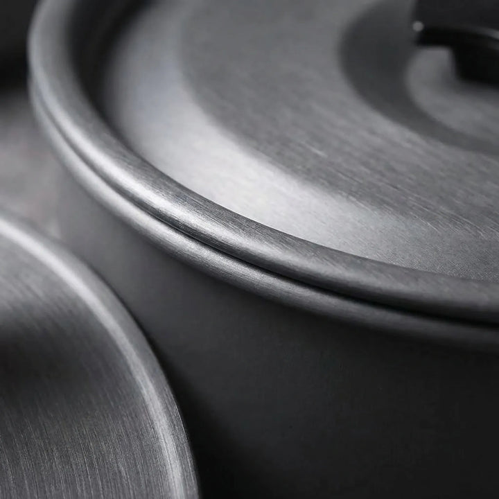 Durable hiking gear: an essential portable camp kitchen set for outdoor cooking adventures.