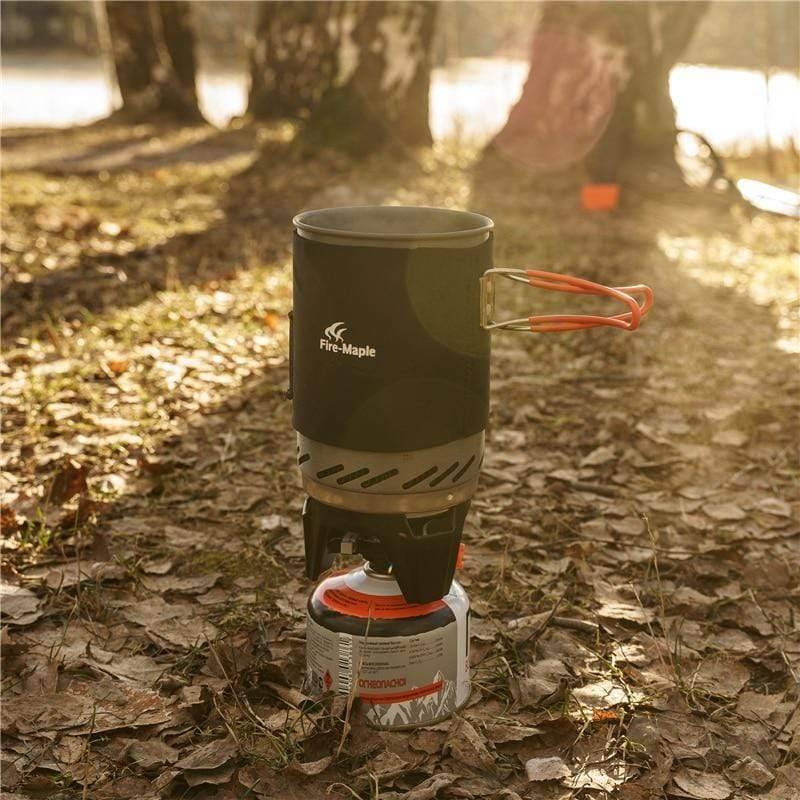 Detailed view of camping stove's heat exchanger fins on pot for fast & efficient outdoor cooking