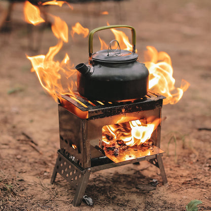 Survival gear: portable wood burning camp stove in a natural outdoor setting, ready for cooking.