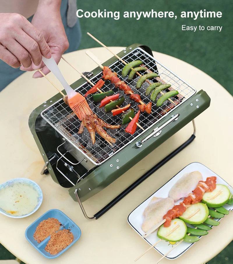 Closeup of portable charcoal BBQ grill, highlighting sturdy stainless steel construction